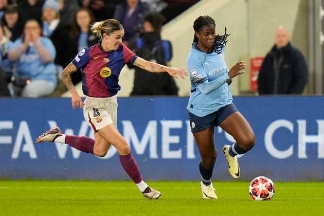 9th October 2024; Joie Stadium, Manchester, England; UEFA Womens Champions League Football, Manchester City versus Barcelona; Khadija Shaw of Manchester City breaks past Mapi Leon of Barcelona women  ActionPlus12702115 StevenxFlynn