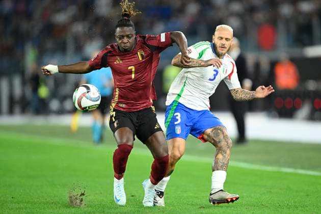 Italy v Belgium - UEFA Nations League 10 10 2024 ROME, ITALY - OCTOBER 10 : Doku Jeremy forward of Belgium battles for possession with Dimarco Frederico defender of Italy during the 2024 - 2025 UEFA Nations League - League phase League A Group A2 match between Italy and Belgium at the Stadio Olympico on October 10, 2024 in Rome, Italy, 10 10 2024 Rome Italy  Copyright: xNicoxVereeckenx