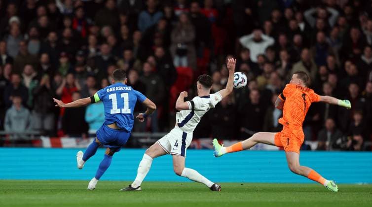 Anastasios Bakasetas of Greece with a shot on goal after Jordan Pickford of England mikstake England v Greece - UEFA Nations League - League B - Group 2. Football. Wembey Stadium, London. UK. 10 OCT 2024 Editorial use only  Copyright: xJASONPIX Shutterstockx 14774704j