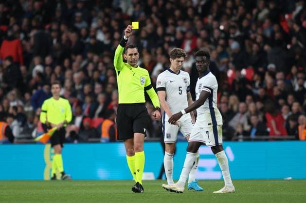 London, England, October 10th 2024: Match referee Andrea Colombo books Bukayo Saka (7 England) during the UEFA Nations League game between England and Greece at Wembley Stadium in London, England (Alexander Canillas SPP) Copyright: xAlexanderxCanillas SPPx spp-en-AlCa-9U2A1323