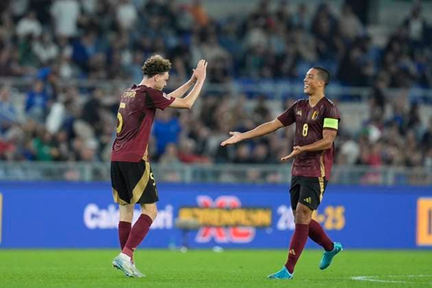 Maxim De Cuyper (Belgium) celebrates with Youri Tielemans (Belgium) after scoring his team s first goal, UEFA Nations League 2024 25 League A Group A2, Italy v Belgium, Stadio Olimpico, October 10, 2024, Rome, Italy.