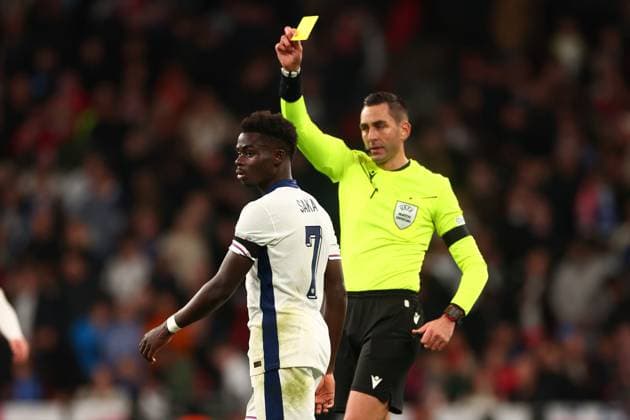 10th October 2024; Wembley Stadium, London, England; Nations League, League B, Group 2 International Football, England versus Greece; Bukayo Saka of England is shown a yellow card for blocking the break by Greece  ActionPlus12702207 ShaunxBrooks