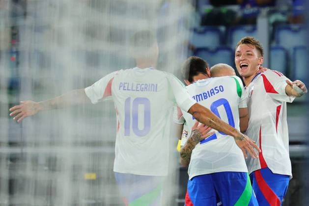 Mateo Retegui of Italy celebrates with team mates after scoring the goal of 2-0 during the UEFA Nations League football match between Italy and Belgium at Olimpico stadium in Rome (Italy), October 10th, 2024. cesarexpurini