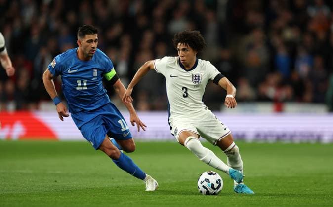 Rico Lewis of England with Anastasios Bakasetas of Greece England v Greece - UEFA Nations League - League B - Group 2. Football. Wembey Stadium, London. UK. 10 OCT 2024 Editorial use only  Copyright: xJASONPIX Shutterstockx 14774704z