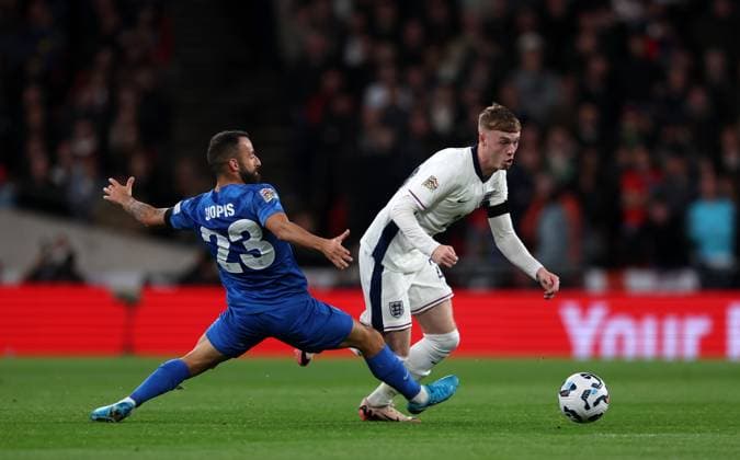 Cole Palmer of England with Manolis Siopis of Greece England v Greece - UEFA Nations League - League B - Group 2. Football. Wembey Stadium, London. UK. 10 OCT 2024 Editorial use only  Copyright: xJASONPIX Shutterstockx 14774704v