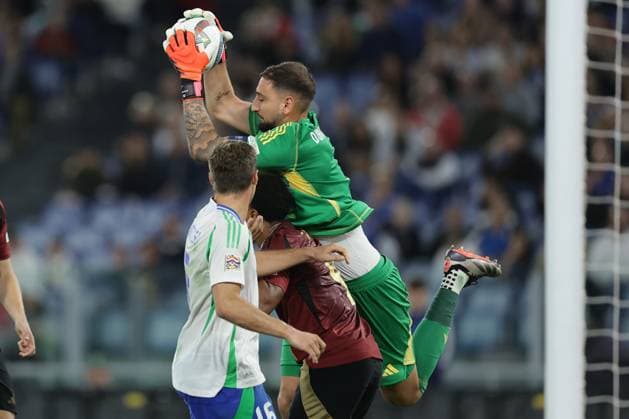 UEFA Nations League 2024 match Italy - Belgium Gianluigi Donnarumma of Italy (Paris Saint-Germain) challenges for the ball with Lois Openda of Belgium (Leipzig) during the UEFA Nations League 2024 match between Italy - Belgium at the Olimpico stadium, Rome, Italy October 10, 2023. ABPH6787 Copyright: xAntonioxBalascox