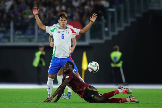 Samuele Ricci of Italy and Orel Mangala of Belgium compete for the ball during the UEFA Nations League football match between Italy and Belgium at Olimpico stadium in Rome (Italy), October 10th, 2024. cesarexpurini