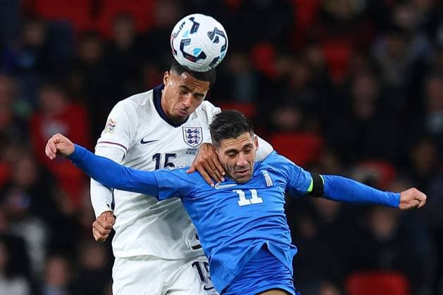 Levi Colwill of England battles with Tasos Bakasetas of Greece England v Greece, UEFA Nations League, League B, Group 2, Football, Wembley Stadium, London, UK, 10 Oct 2024 EDITORIAL USE ONLY No use with unauthorised audio, video, data, fixture lists, club league logos or live services. Online in-match use limited to 120 images, no video emulation. No use in betting, games or single club league player publications. Copyright: xMichaelxZemanek Shutterstockx 14767424ex