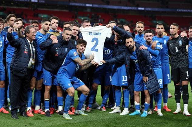 Greece Players tribute to George Baldock by holding up his shirt England v Greece - UEFA Nations League - League B - Group 2. Football. Wembey Stadium, London. UK. 10 OCT 2024 Editorial use only  Copyright: xJASONPIX Shutterstockx 14774704aq