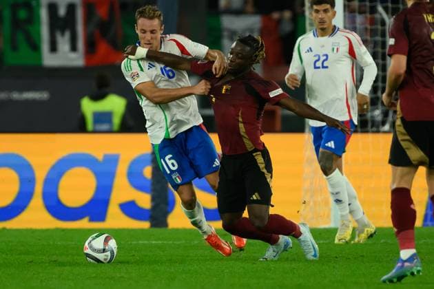 Davide Frattesi of Italy and Jeremy Doku of Belgium during the UEFA Nations League football match between Italy and Belgium at Olimpico stadium in Rome (Italy), October 10, 2024. AndreaxStaccioli