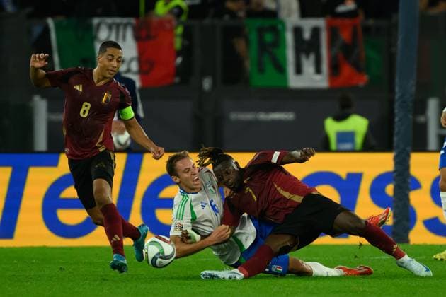 Youri Tielemans of Belgium, Davide Frattesi of Italy and Jeremy Doku of Belgium during the UEFA Nations League football match between Italy and Belgium at Olimpico stadium in Rome (Italy), October 10, 2024. AndreaxStaccioli