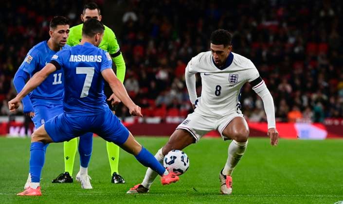 England v Greece, London, UK - 10 Oct 2024 Jude Bellingham of England challenges for the ball with Georgios Masouras of Greece during the UEFA Nations League match between England and Greece on 10th October 2024 at Wembley Stadium, London London Wembley Stadium London GBR Copyright: xFrankiexOKeeffe PPAUKx PPA-141817
