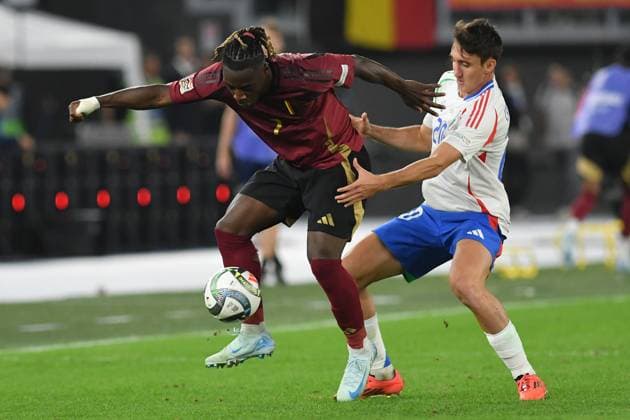 Soccer, Nation League match , Italy-Belgium Jeremy Doku of Belgium,Andrea Cambiaso of Italy during Nation League phase Matchday 3 League A Group A2 Italy-Belgium at Olympic stadium, Italy, Oct 10th, 2024. Imago-Images Emmefoto Copyright: xImago-Images Emmefotox