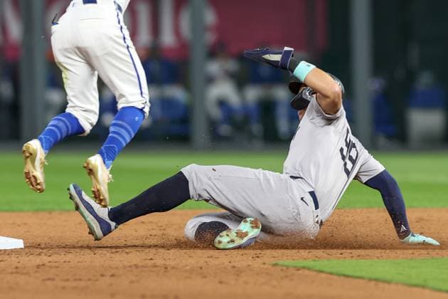 October 10, 2024: New York Yankees center fielder Aaron Judge (99) steals second base beating the tag from Kansas City Royals second baseman Michael Massey (19) during the eighth inning of game 4 of the American League Division Series at Kauffman Stadium in Kansas City, MO. CSM Kansas City United States of America - ZUMAc04_ 20241010_zma_c04_033 Copyright: xDavidxSmithx