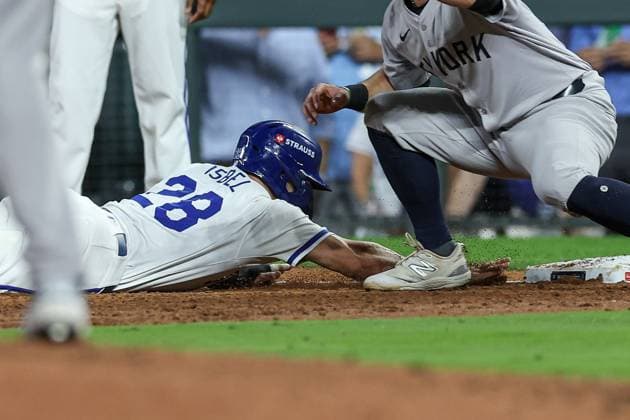 October 10, 2024: Kansas City Royals center fielder Kyle Isbel (28) slides back into first base safe beating the tag from New York Yankees first baseman Jon Berti (19) during the third inning of game 4 of the American League Division Series at Kauffman Stadium in Kansas City, MO. CSM Kansas City United States of America - ZUMAc04_ 20241010_zma_c04_047 Copyright: xDavidxSmithx