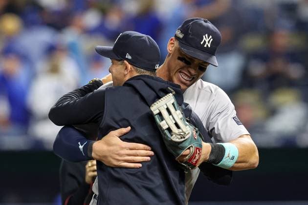 October 10, 2024: New York Yankees manager Aaron Boone (17), left, and New York Yankees center fielder Aaron Judge (99), right, celebrate their 3-1 win over the Kansas City Royals clinching the American League Division Series at Kauffman Stadium in Kansas City, MO. CSM Kansas City United States of America - ZUMAc04_ 20241010_zma_c04_069 Copyright: xDavidxSmithx