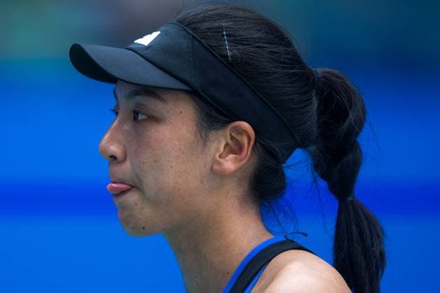 (241011) -- WUHAN, Oct. 11, 2024 -- Wang Xinyu reacts during the women s singles quarterfinal between Wang Xinyu of China and Ekaterina Alexandrova of Russia at the 2024 Wuhan Open tennis tournament in Wuhan, capital of central China s Hubei Province, Oct. 11, 2024. ) (SP)CHINA-WUHAN-TENNIS-WUHAN OPEN-WOMEN S SINGLES (CN) XiaoxYijiu 