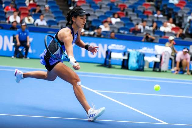 WUHAN, CHINA - OCTOBER 11: Wang Xinyu of China competes in the Women s Singles Quarterfinal match against Ekaterina Alexandrova of Russia on day seven of 2024 Wuhan Open at Optics Valley International Tennis Center on October 11, 2024 in Wuhan, Hubei Province of China.  Copyright: xVCGx 111523199908