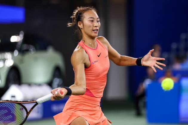 WUHAN, CHINA - OCTOBER 11: Zheng Qinwen of China competes in the Women s Singles Quarterfinal match against Jasmine Paolini of Italy on day seven of 2024 Wuhan Open at Optics Valley International Tennis Center on October 11, 2024 in Wuhan, Hubei Province of China.  Copyright: xVCGx 111523247146