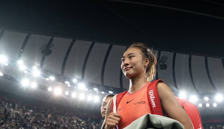 (241011) -- WUHAN, Oct. 11, 2024 -- Zheng Qinwen reacts after the women s singles quarterfinal match between Zheng Qinwen of China and Jasmine Paolini of Italy at the 2024 Wuhan Open tennis tournament in Wuhan, capital of central China s Hubei Province, Oct. 11, 2024. ) (SP)CHINA-WUHAN-TENNIS-WUHAN OPEN-WOMEN S SINGLES (CN) XiaoxYijiu 