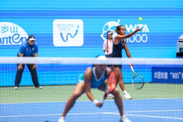 WUHAN, CHINA - OCTOBER 12: Leylah Fernandez of Canada and Aldila Sutjiadi of Indonesia compete in the Women s Doubles Semifinal match against Asia Muhammad of United States and Jessica Pegula of United States on day eight of 2024 Wuhan Open at Optics Valley International Tennis Center on October 12, 2024 in Wuhan, Hubei Province of China.  Copyright: xVCGx 111523388197