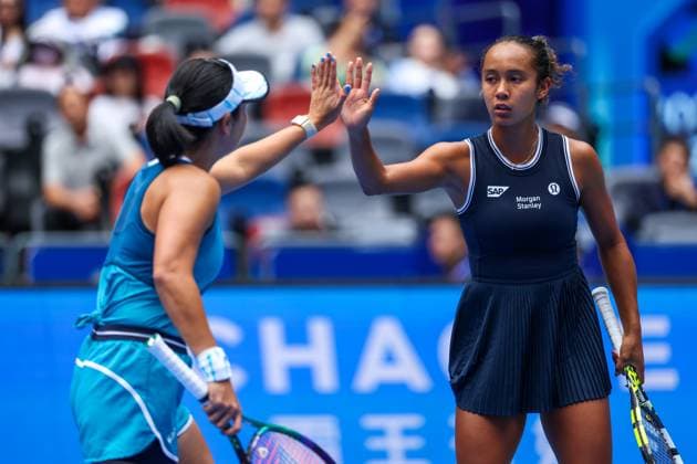 WUHAN, CHINA - OCTOBER 12: Leylah Fernandez of Canada and Aldila Sutjiadi of Indonesia in action in the Women s Doubles Semifinal match against Asia Muhammad of United States and Jessica Pegula of United States on day eight of 2024 Wuhan Open at Optics Valley International Tennis Center on October 12, 2024 in Wuhan, Hubei Province of China.  Copyright: xVCGx 111523383518
