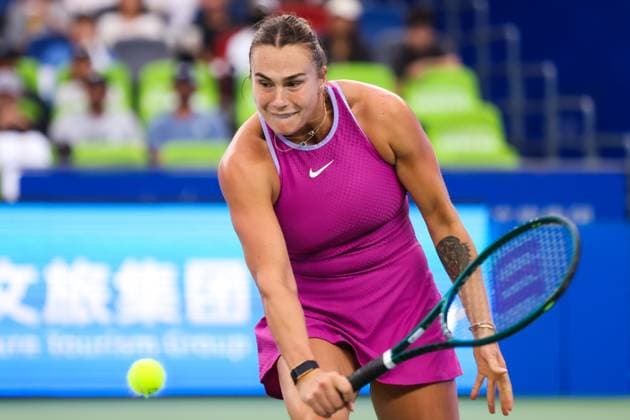 WUHAN, CHINA - OCTOBER 12: Aryna Sabalenka of Belarus competes in the Women s Singles Semifinal match against Coco Gauff of United States on day eight of 2024 Wuhan Open at Optics Valley International Tennis Center on October 12, 2024 in Wuhan, Hubei Province of China.  Copyright: xVCGx 111523399021