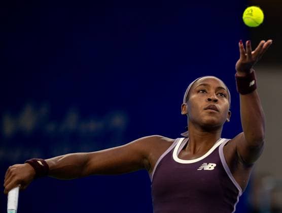 (241012) -- WUHAN, Oct. 12, 2024 -- Coco Gauff serves during the women s singles semifinal match between Aryna Sabalenka of Belarus and Coco Gauff of the United States at the 2024 Wuhan Open tennis tournament in Wuhan, central China s Hubei Province, Oct. 12, 2024. ) (SP)CHINA-WUHAN-TENNIS-WUHAN OPEN-WOMEN S SINGLES (CN) HuxJingwen 