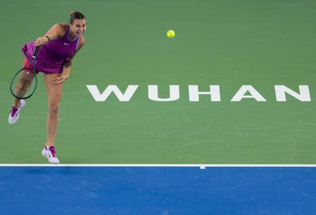 (241012) -- WUHAN, Oct. 12, 2024 -- Aryna Sabalenka serves during the women s singles semifinal match between Aryna Sabalenka of Belarus and Coco Gauff of the United States at the 2024 Wuhan Open tennis tournament in Wuhan, central China s Hubei Province, Oct. 12, 2024. ) (SP)CHINA-WUHAN-TENNIS-WUHAN OPEN-WOMEN S SINGLES (CN) HuxJingwen 