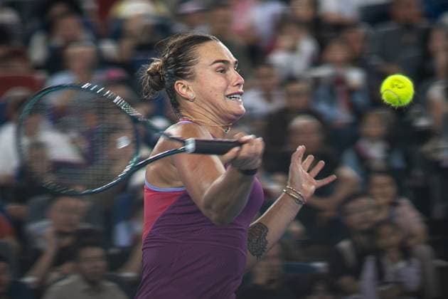 (241012) -- WUHAN, Oct. 12, 2024 -- Aryna Sabalenka hits a return during the women s singles semifinal match between Aryna Sabalenka of Belarus and Coco Gauff of the United States at the 2024 Wuhan Open tennis tournament in Wuhan, central China s Hubei Province, Oct. 12, 2024. ) (SP)CHINA-WUHAN-TENNIS-WUHAN OPEN-WOMEN S SINGLES (CN) XiaoxYijiu 