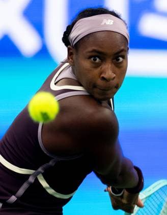 (241012) -- WUHAN, Oct. 12, 2024 -- Coco Gauff hits a return during the women s singles semifinal match between Aryna Sabalenka of Belarus and Coco Gauff of the United States at the 2024 Wuhan Open tennis tournament in Wuhan, central China s Hubei Province, Oct. 12, 2024. ) (SP)CHINA-WUHAN-TENNIS-WUHAN OPEN-WOMEN S SINGLES (CN) HuxJingwen 