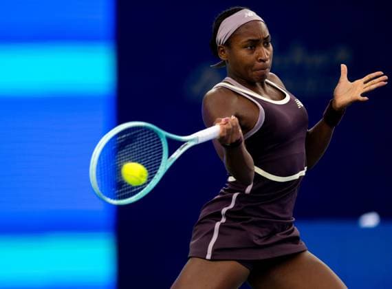 (241012) -- WUHAN, Oct. 12, 2024 -- Coco Gauff hits a return during the women s singles semifinal match between Aryna Sabalenka of Belarus and Coco Gauff of the United States at the 2024 Wuhan Open tennis tournament in Wuhan, central China s Hubei Province, Oct. 12, 2024. ) (SP)CHINA-WUHAN-TENNIS-WUHAN OPEN-WOMEN S SINGLES (CN) HuxJingwen 