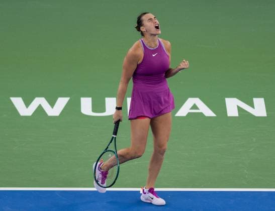 (241012) -- WUHAN, Oct. 12, 2024 -- Aryna Sabalenka reacts during the women s singles semifinal match between Aryna Sabalenka of Belarus and Coco Gauff of the United States at the 2024 Wuhan Open tennis tournament in Wuhan, central China s Hubei Province, Oct. 12, 2024. ) (SP)CHINA-WUHAN-TENNIS-WUHAN OPEN-WOMEN S SINGLES (CN) HuxJingwen 
