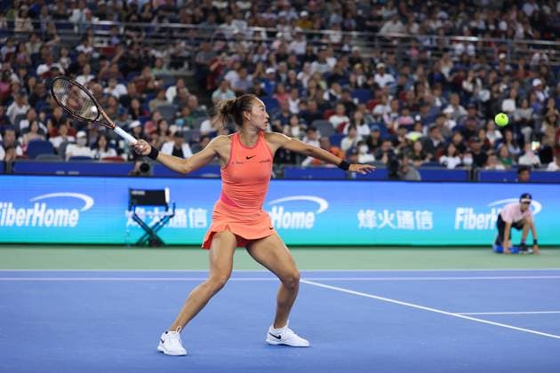 WUHAN, CHINA - OCTOBER 12: Zheng Qingwen of China competes in the Women s Singles Semifinal match against Wang Xinyu of China on day eight of 2024 Wuhan Open at Optics Valley International Tennis Center on October 12, 2024 in Wuhan, Hubei Province of China.  Copyright: xVCGx 111523420796