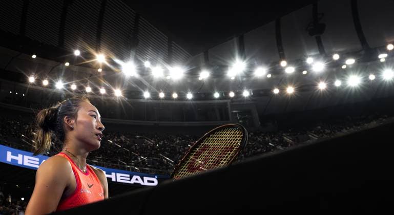 (241012) -- WUHAN, Oct. 12, 2024 -- Zheng Qinwen reacts during the women s singles semifinal match between Zheng Qinwen of China and Wang Xinyu of China at the 2024 Wuhan Open tennis tournament in Wuhan, central China s Hubei Province, Oct. 12, 2024. ) (SP)CHINA-WUHAN-TENNIS-WUHAN OPEN-WOMEN S SINGLES (CN) XiaoxYijiu 