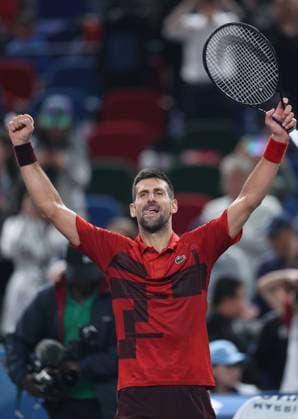 (241012) -- SHANGHAI, Oct. 12, 2024 -- Novak Djokovic celebrates after winning the men s singles semifinal match between Taylor Fritz of the United States and Novak Djokovic of Serbia at the ATP, Tennis Herren World Tour Shanghai Masters tennis tournament in Shanghai, east China, Oct. 12, 2024. ) (SP)CHINA-SHANGHAI-TENNIS-ATP TOUR-SHANGHAI MASTERS(CN) BaixXuefei 