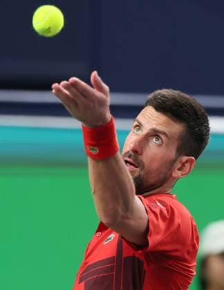 (241012) -- SHANGHAI, Oct. 12, 2024 -- Novak Djokovic serves during the men s singles semifinal match between Taylor Fritz of the United States and Novak Djokovic of Serbia at the ATP, Tennis Herren World Tour Shanghai Masters tennis tournament in Shanghai, east China, Oct. 12, 2024. ) (SP)CHINA-SHANGHAI-TENNIS-ATP TOUR-SHANGHAI MASTERS(CN) WangxXiang 
