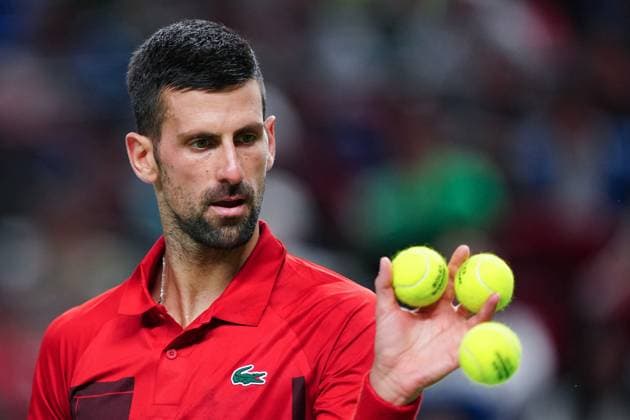 (241012) -- SHANGHAI, Oct. 12, 2024 -- Novak Djokovic reacts during the men s singles semifinal match between Taylor Fritz of the United States and Novak Djokovic of Serbia at the ATP, Tennis Herren World Tour Shanghai Masters tennis tournament in Shanghai, east China, Oct. 12, 2024. ) (SP)CHINA-SHANGHAI-TENNIS-ATP TOUR-SHANGHAI MASTERS(CN) XuxYanan 
