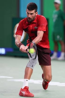 (241012) -- SHANGHAI, Oct. 12, 2024 -- Novak Djokovic hits a return during the men s singles semifinal match between Taylor Fritz of the United States and Novak Djokovic of Serbia at the ATP, Tennis Herren World Tour Shanghai Masters tennis tournament in Shanghai, east China, Oct. 12, 2024. ) (SP)CHINA-SHANGHAI-TENNIS-ATP TOUR-SHANGHAI MASTERS(CN) WangxXiang 