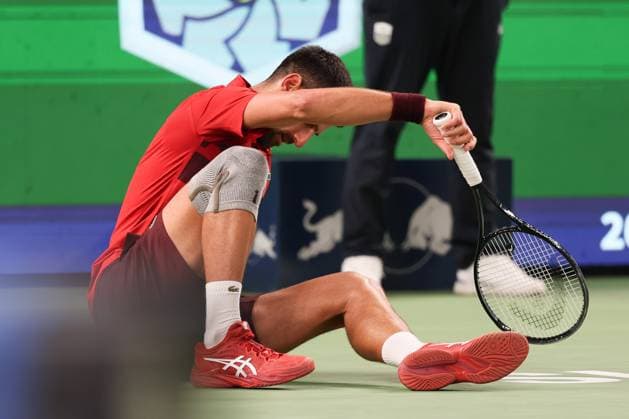 (241012) -- SHANGHAI, Oct. 12, 2024 -- Novak Djokovic falls on the ground during the men s singles semifinal match between Taylor Fritz of the United States and Novak Djokovic of Serbia at the ATP, Tennis Herren World Tour Shanghai Masters tennis tournament in Shanghai, east China, Oct. 12, 2024. ) (SP)CHINA-SHANGHAI-TENNIS-ATP TOUR-SHANGHAI MASTERS(CN) WangxXiang 