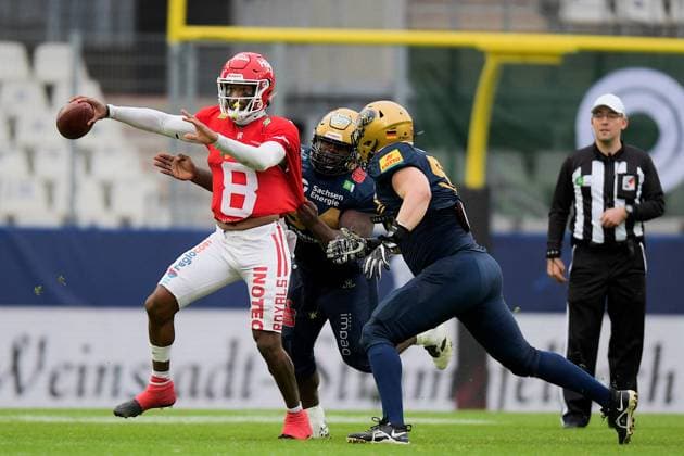 Jaylon Henderson 8, QB, Potsdam Royals under pressure from Jonas Schultes 52, DL, Dresden Monarchs and Lamonte McDougle 94, DL, Dresden Monarchs GER, Potsdam Royals vs Dresden Monarchs, American Football, GFL, Bowl, Season 2024 25, 12 10 2024 GER, Dresden Monarchs vs Potsdam Royals, American Football, GFL, Bowl, Season 2024 25, 12 10 2024 Essen Copyright: xEibner-Pressefoto FlorianxWolfx EP_FWF