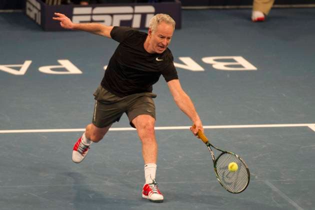 TENNIS 2014: BNP Paribas Showdown Murray vs Djokovic MAR 03 March 3, 2014 - Manhattan, New York, U.S - March 03, 2014: John McEnroe reaches for a volley during the BNP Paribas Showdown on World Tennis Day at Madison Square Garden in Manhattan, New York. Manhattan New York U.S. EDITORIAL USE ONLY Copyright: xx ZUMA-20140303_zaf_c04_019.jpg KostasxLymperopoulosx csmphoto890373