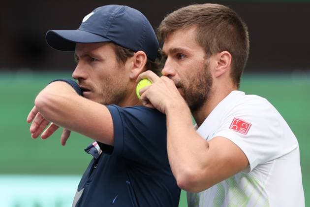 (241013) -- SHANGHAI, Oct. 13, 2024 -- Wesley Koolhof (L) of the Netherlands Nikola Mektic of Croatia react during the men s doubles final match against Maximo Gonzalez Andres Molteni of Argentina at the ATP, Tennis Herren World Tour Shanghai Masters tennis tournament in Shanghai, east China, Oct. 13, 2024. ) (SP)CHINA-SHANGHAI-TENNIS-ATP TOUR-SHANGHAI MASTERS(CN) WangxXiang 