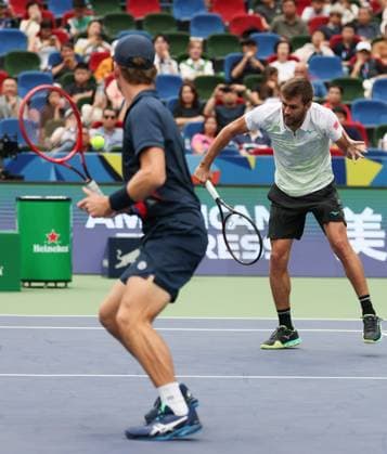 (241013) -- SHANGHAI, Oct. 13, 2024 -- Wesley Koolhof (L) of the Netherlands Nikola Mektic of Croatia compete against Maximo Gonzalez Andres Molteni of Argentina during the men s doubles final match at the ATP, Tennis Herren World Tour Shanghai Masters tennis tournament in Shanghai, east China, Oct. 13, 2024. ) (SP)CHINA-SHANGHAI-TENNIS-ATP TOUR-SHANGHAI MASTERS(CN) WangxXiang 