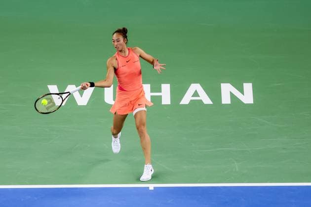 WUHAN, CHINA - OCTOBER 13: Zheng Qinwen of China competes in the Women s Singles Final match against Aryna Sabalenka on day nine of 2024 Wuhan Open at Optics Valley International Tennis Center on October 13, 2024 in Wuhan, Hubei Province of China.  Copyright: xVCGx 111523538366