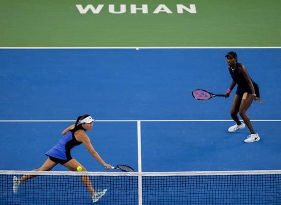 (241013) -- WUHAN, Oct. 13, 2024 -- Asia Muhammad Jessica Pegula (L) compete during the women s doubles final match between Anna Danilina of Kazakhstan Irina Khromacheva of Russia and Asia Muhammad Jessica Pegula of the United States at the 2024 Wuhan Open tennis tournament in Wuhan, central China s Hubei Province, Oct. 13, 2024. ) (SP)CHINA-WUHAN-TENNIS-WUHAN OPEN-WOMEN S DOUBLES-FINAL(CN) HuxJingwen 
