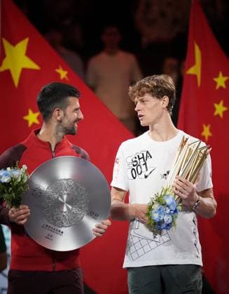 SHANGHAI, CHINA - OCTOBER 13: Champion Jannik Sinner (R) of Italy and runner-up Novak Djokovic of Serbia react with their trophies during the awarding ceremony after the Men s Singles Final match on day 14 of 2024 Shanghai Rolex Masters at Qi Zhong Tennis Centre on October 13, 2024 in Shanghai, China.  Copyright: xVCGx 111523550974