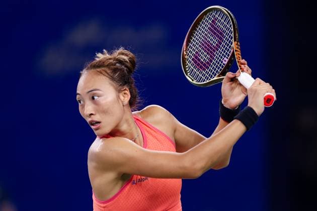 WUHAN, CHINA - OCTOBER 13: Zheng Qinwen of China competes in the Women s Singles Final match against Aryna Sabalenka on day nine of 2024 Wuhan Open at Optics Valley International Tennis Center on October 13, 2024 in Wuhan, Hubei Province of China.  Copyright: xVCGx 111523541040