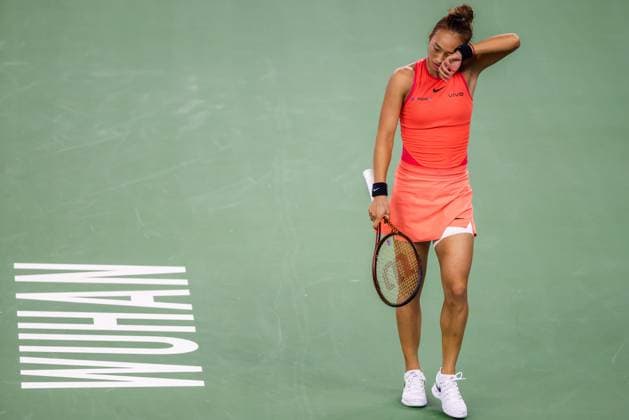 WUHAN, CHINA - OCTOBER 13: Zheng Qinwen of China reacts in the Women s Singles Final match against Aryna Sabalenka on day nine of 2024 Wuhan Open at Optics Valley International Tennis Center on October 13, 2024 in Wuhan, Hubei Province of China.  Copyright: xVCGx 111523550101