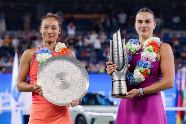 WUHAN, CHINA - OCTOBER 13: Champion Aryna Sabalenka (R) and runner-up Zheng Qinwen of China pose with their trophies during the awarding ceremony after the Women s Singles Final match on day nine of 2024 Wuhan Open at Optics Valley International Tennis Center on October 13, 2024 in Wuhan, Hubei Province of China.  Copyright: xVCGx 111523557132